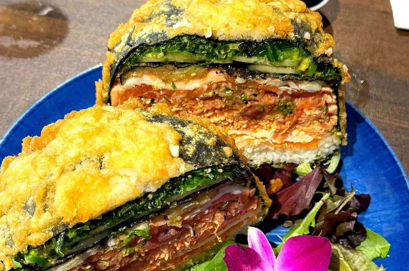 WAVE Sushi spicy salmon burger on blue plate