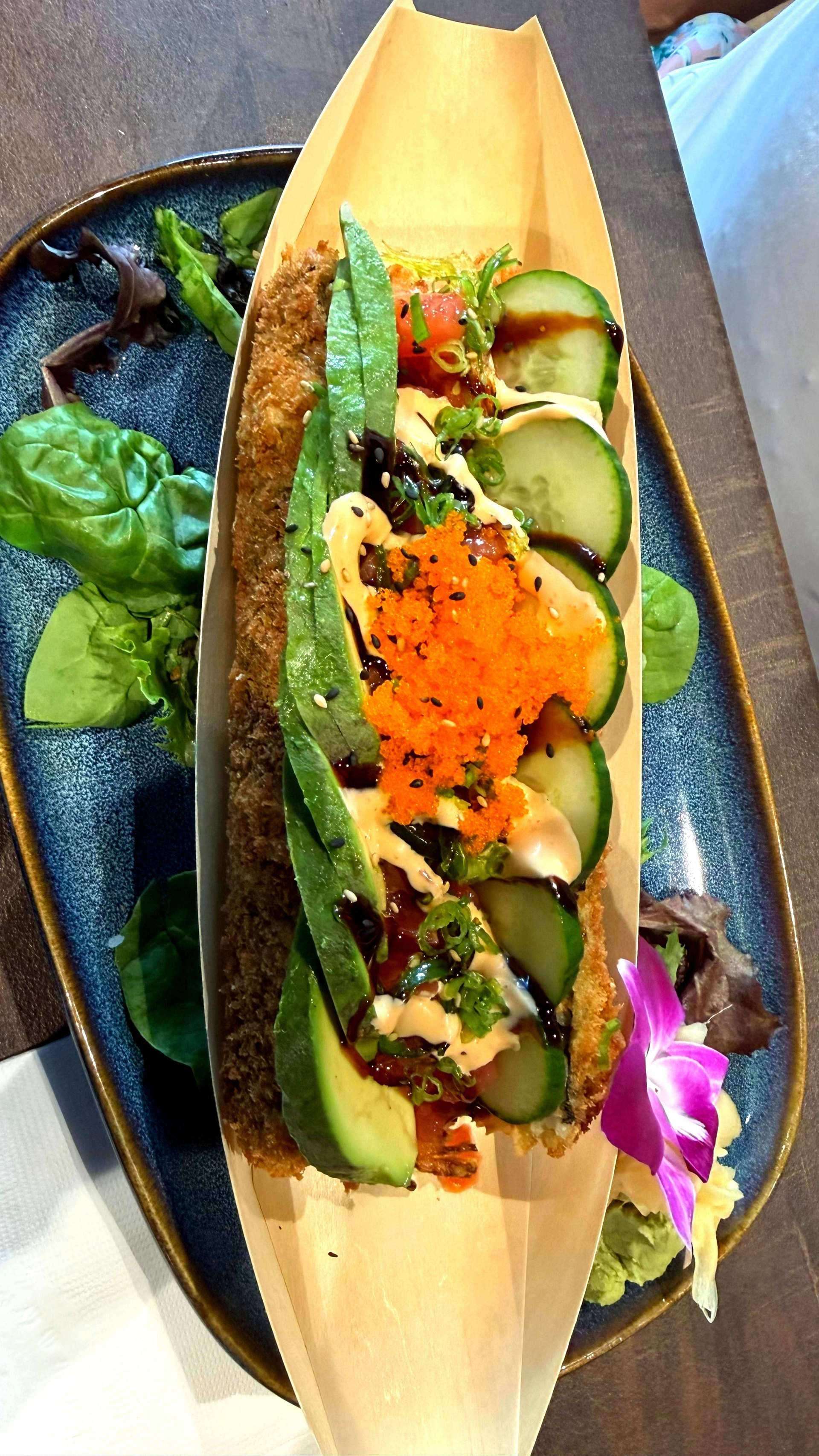 WAVE Sushi hotdog in paper tray with fresh ingredients